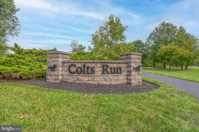a view of a street with a building in the background