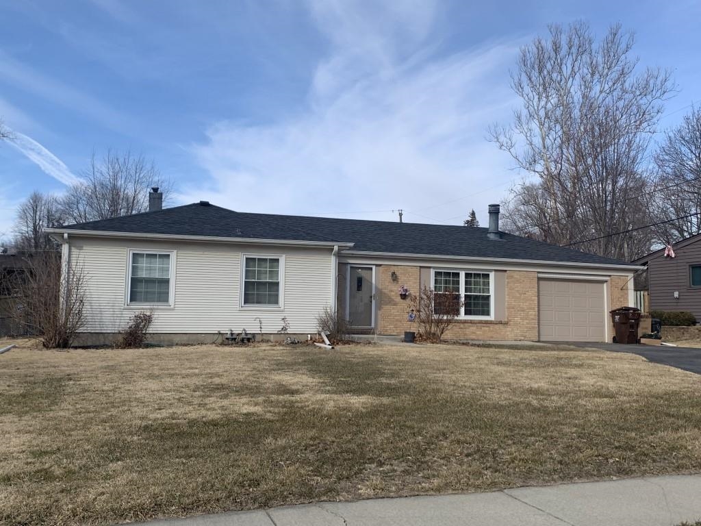 5015 Highcrest Road Rockford, IL 61107 - Photo 1 of 12 a view of a house with a yard