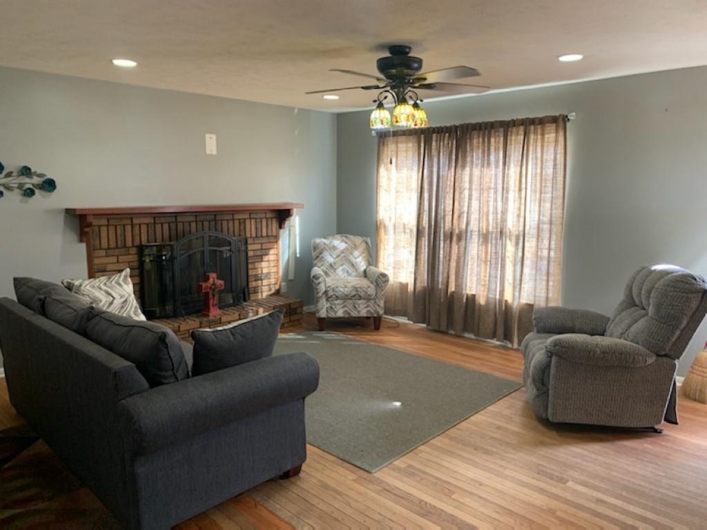 5015 Highcrest Road Rockford, IL 61107 - Photo 3 of 12 a living room with furniture and a large window