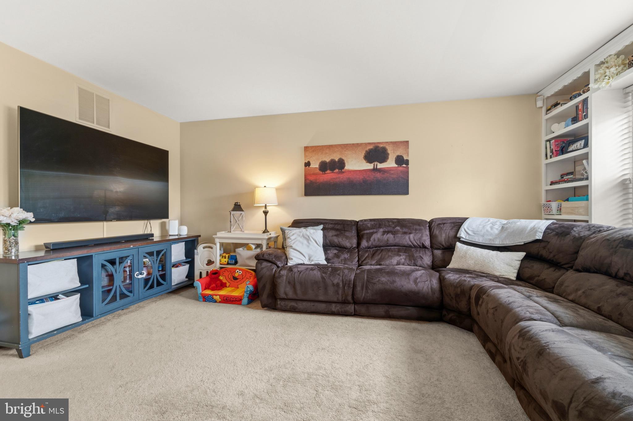 2 Farnham Court Laurel Springs, NJ 08021 - Photo 12 of 33 a living room with furniture and a flat screen tv
