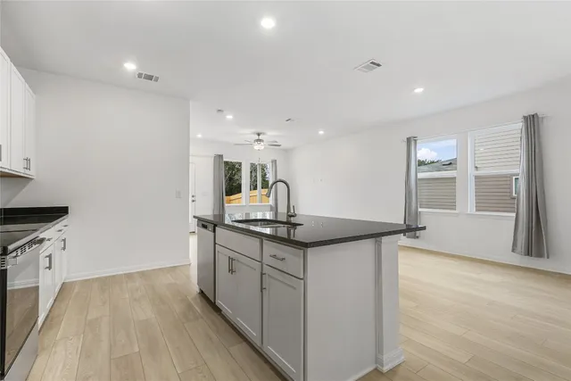 a view of a hallway with staircase