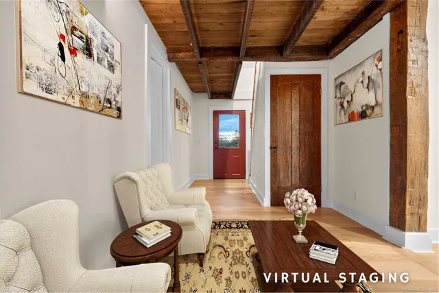 a dining room with a table and chairs
