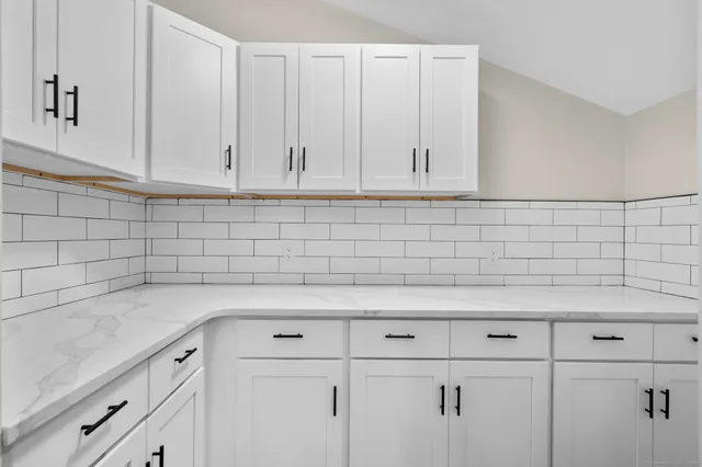 a large kitchen with a lot of counter space