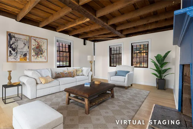 a view of an empty room with a fireplace