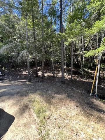 a view of a park with swings and slides