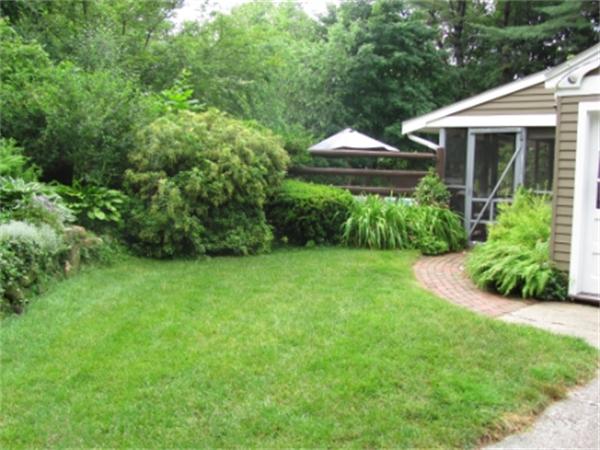 28 Fox Run Road Topsfield, MA 01983 - Photo 3 of 18 a front view of house with yard and green space