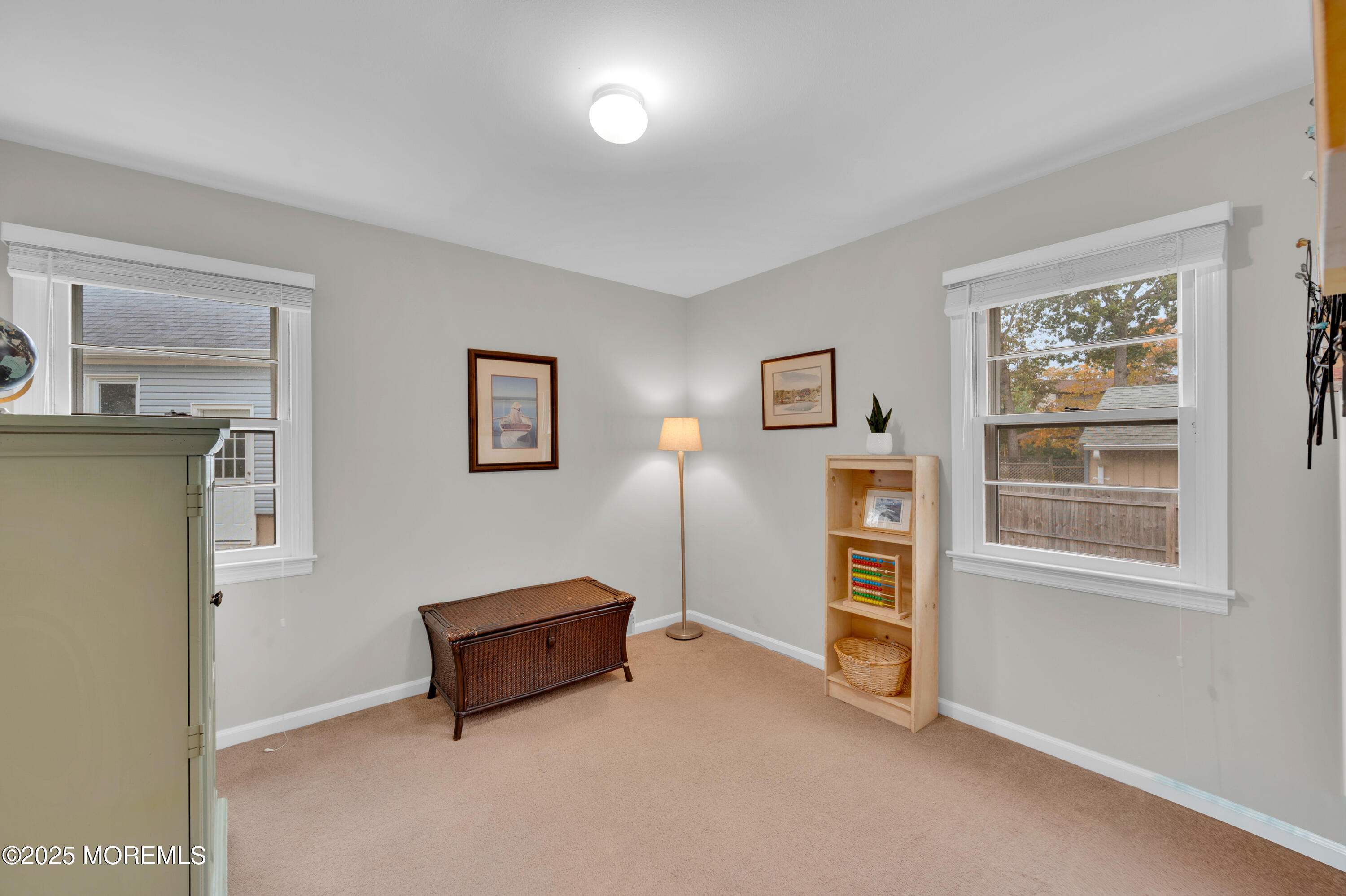 203 Lenape Trail Brielle, NJ 08730 - Photo 16 of 29 a room with a bed and a window
