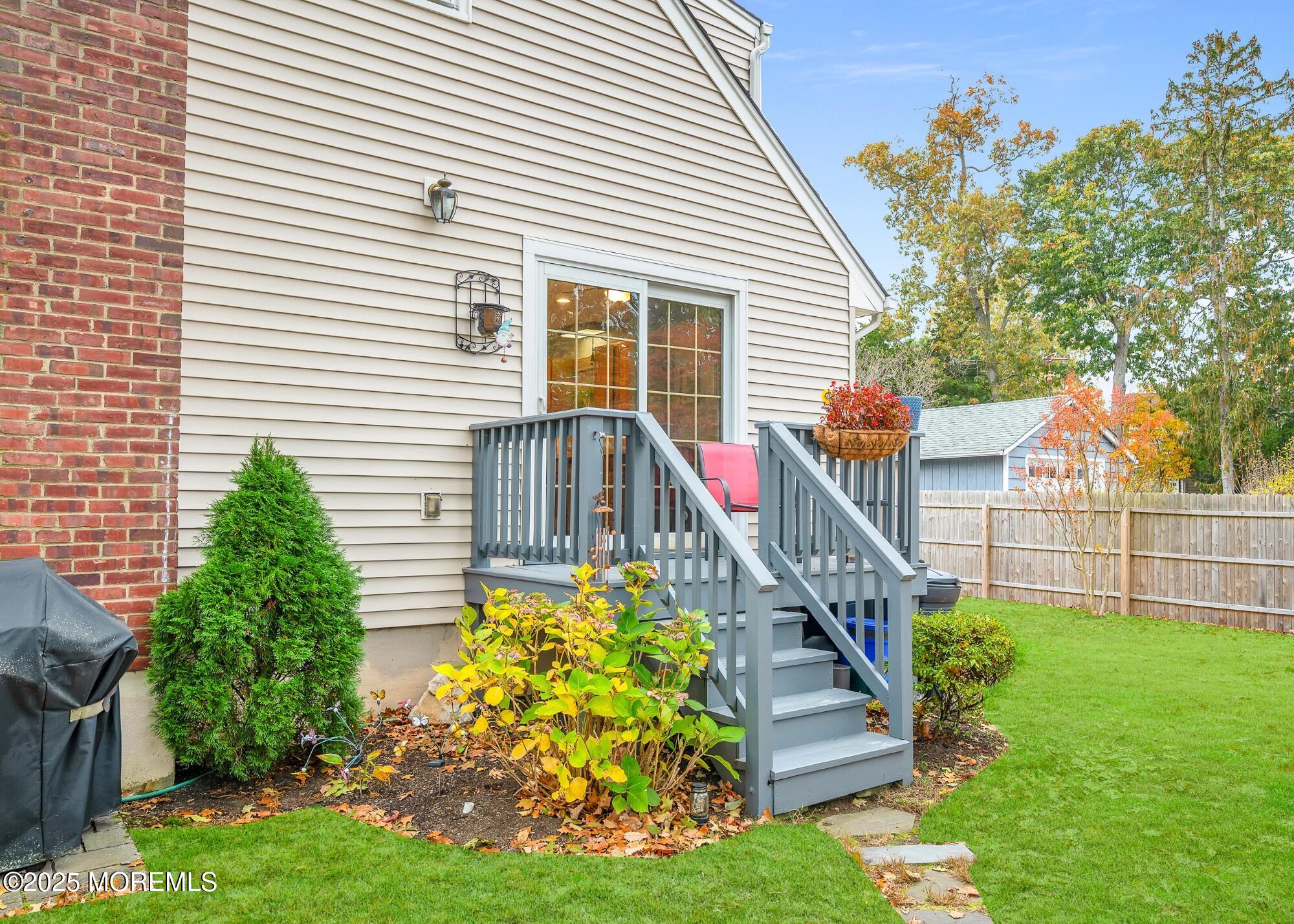 203 Lenape Trail Brielle, NJ 08730 - Photo 21 of 29 a view of a house with a yard