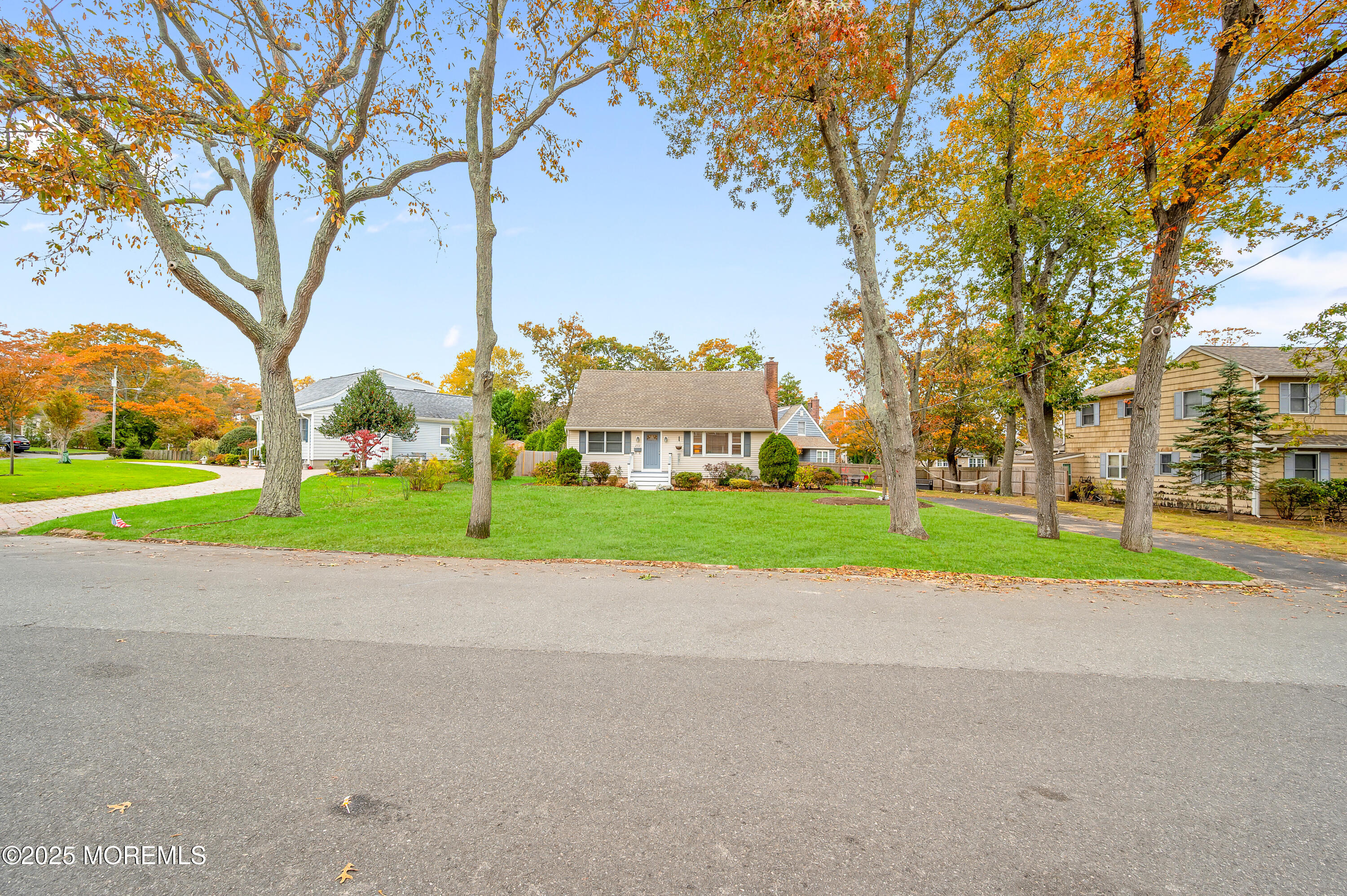 203 Lenape Trail Brielle, NJ 08730 - Photo 26 of 29 a view of road and large trees