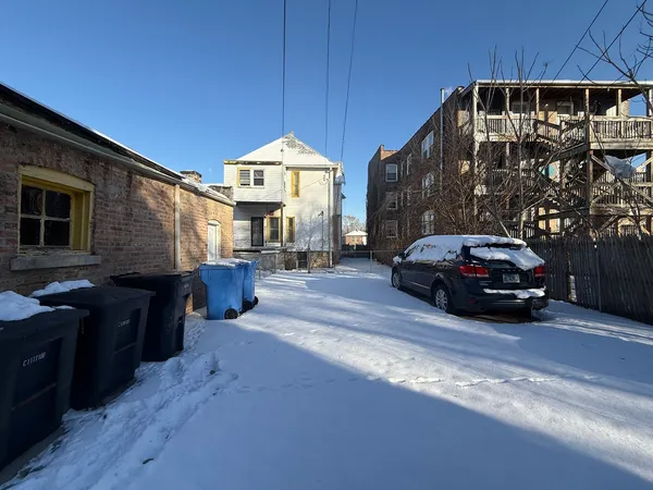 a car parked in front of a house