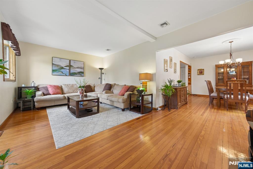 562 Valley Road Clifton, NJ 07013 - Photo 6 of 35 a living room with furniture and wooden floor