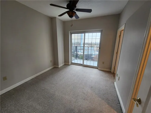 a lamp on a desk next to a window