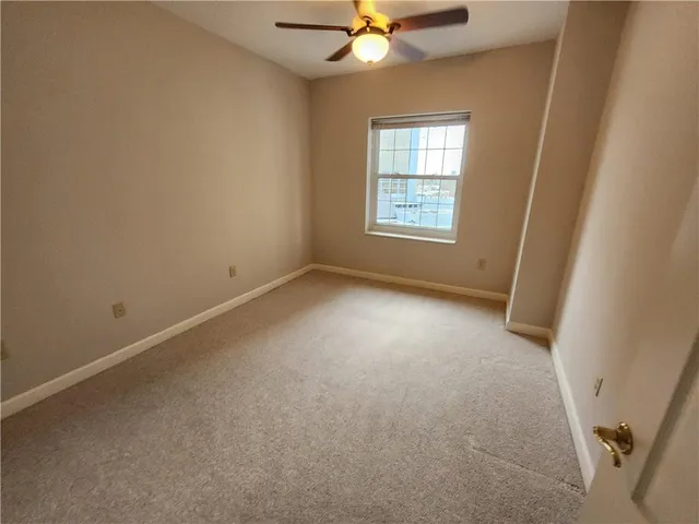 a view of gallery with windows