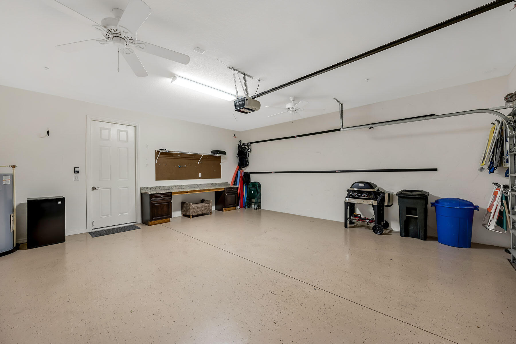 9066 Albion Lane North, Unit 5101 Naples, FL 34113 - Photo 31 of 48 a view of a garage with furniture
