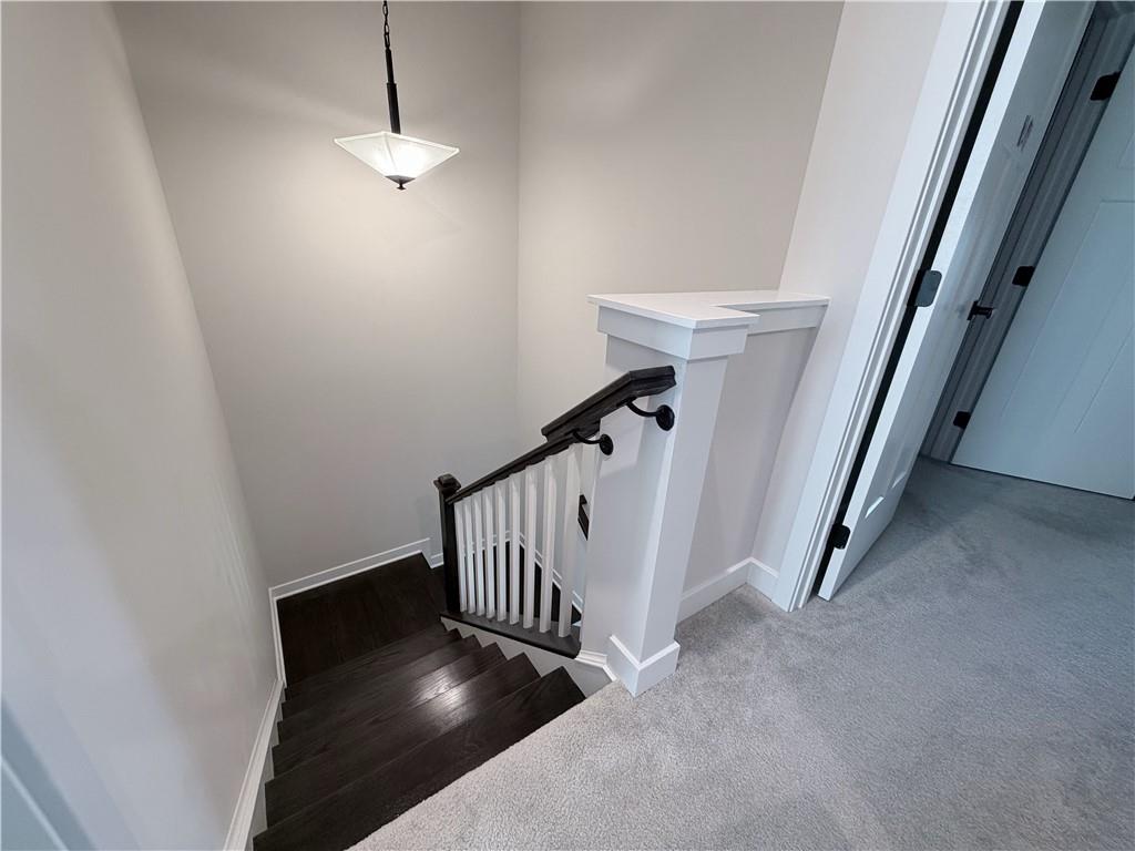 120 Crown Street McKees Rocks, PA 15136 - Photo 12 of 28 a view of a hallway with wooden floor and staircase