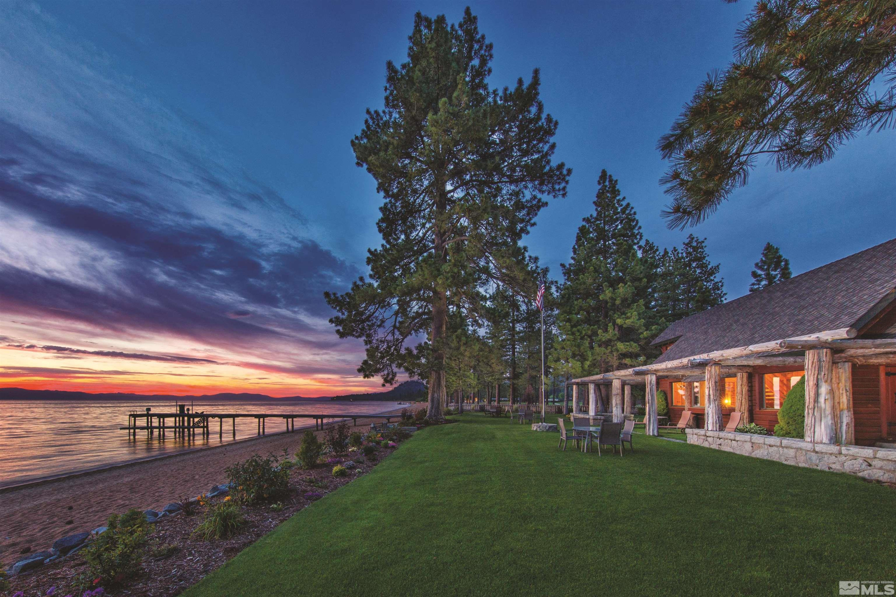121 Chamberlain Court, Unit 185 Carson City, NV 89705 - Photo 15 of 15 a view of a big yard with table and chairs and a fire pit
