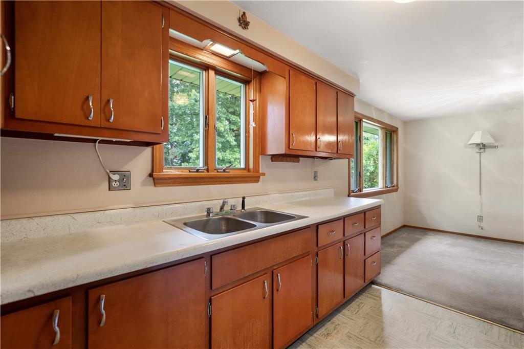 77 Observatory Street Manor, PA 15665 - Photo 12 of 25 a kitchen with a sink and a window