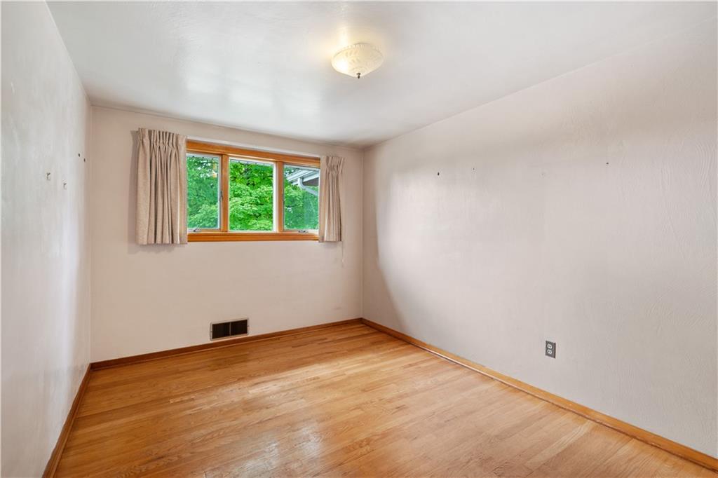 77 Observatory Street Manor, PA 15665 - Photo 13 of 25 an empty room with a window