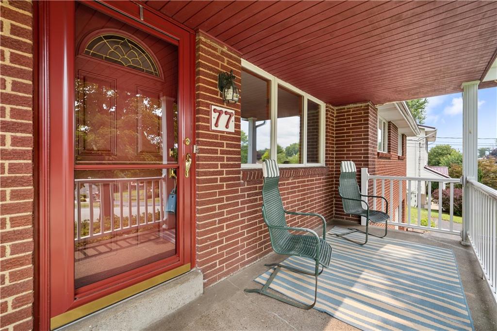 77 Observatory Street Manor, PA 15665 - Photo 2 of 25 a view of a porch with furniture