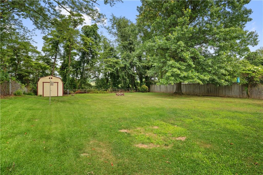 77 Observatory Street Manor, PA 15665 - Photo 24 of 25 a view of a outdoor space with a garden