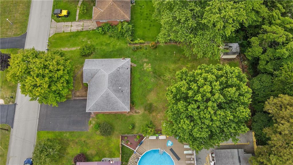 77 Observatory Street Manor, PA 15665 - Photo 4 of 25 an aerial view of a house with a yard basket ball court and outdoor seating