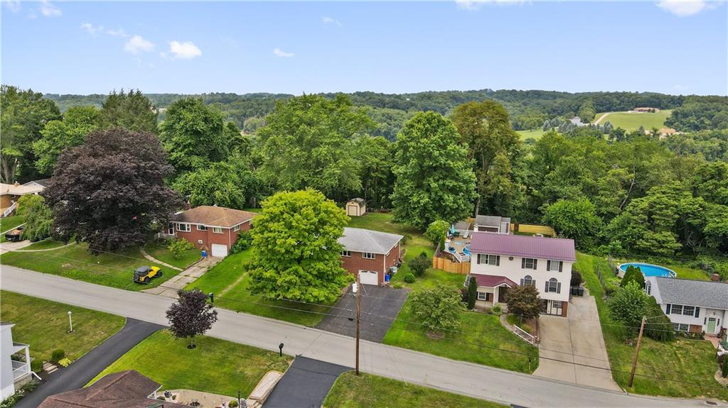 77 Observatory Street Manor, PA 15665 - Photo 5 of 25 an aerial view of a house with yard
