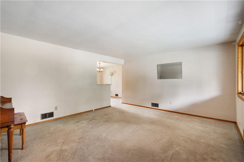 77 Observatory Street Manor, PA 15665 - Photo 7 of 25 an empty room with windows