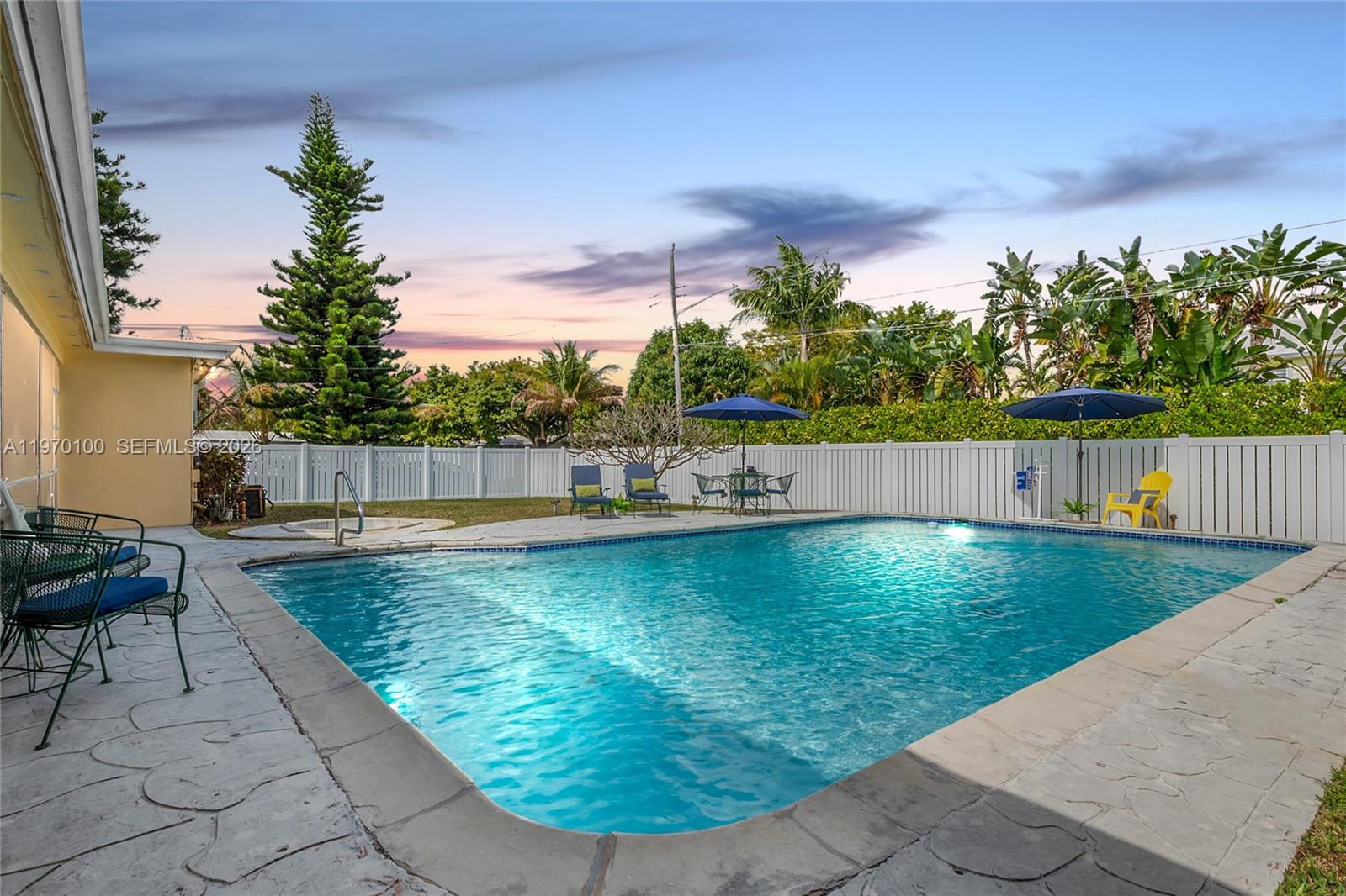 4931 Madison Street Hollywood, FL 33021 - Photo 25 of 26 a view of a swimming pool with a patio
