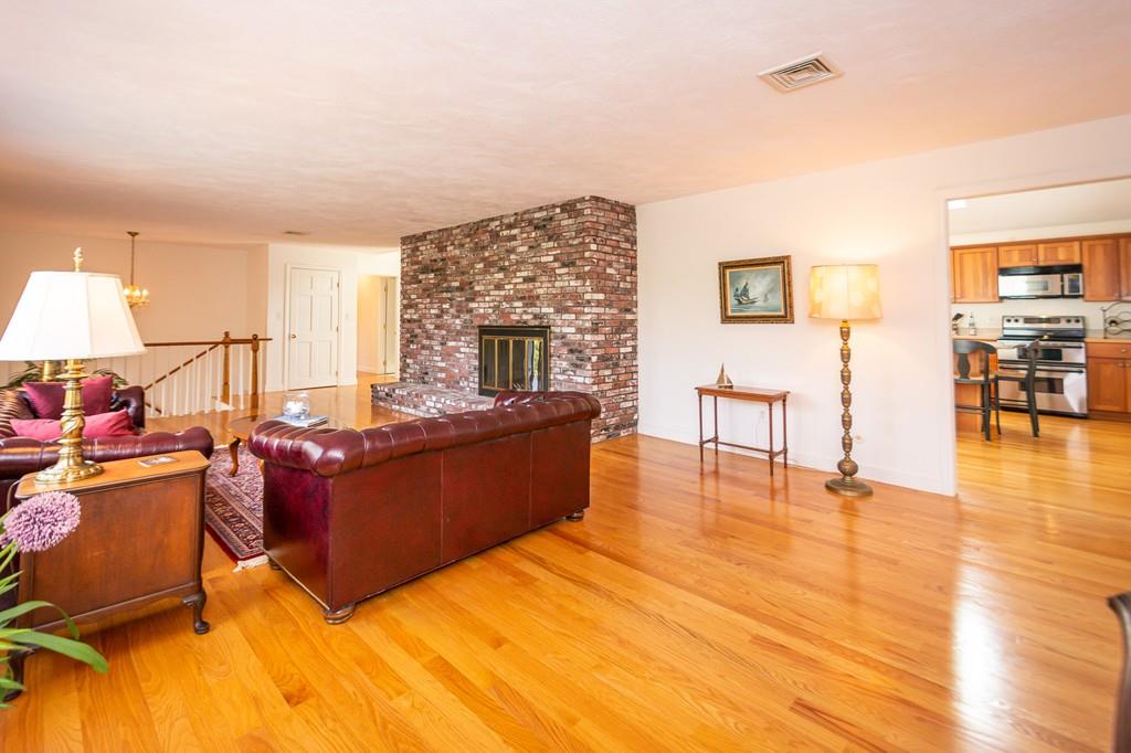 33 Windy Hill Road Cohasset, MA 02025 - Photo 15 of 42 a living room with furniture and a wooden floor