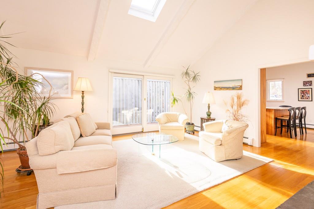 33 Windy Hill Road Cohasset, MA 02025 - Photo 21 of 42 a living room with furniture and a large window