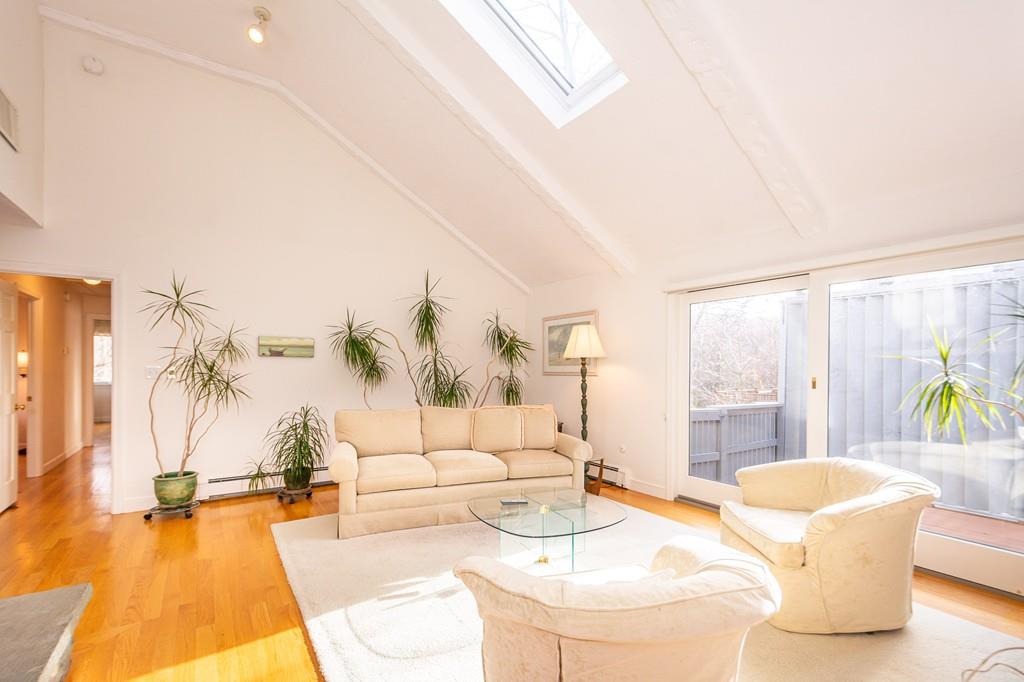33 Windy Hill Road Cohasset, MA 02025 - Photo 24 of 42 a living room with furniture and a large window