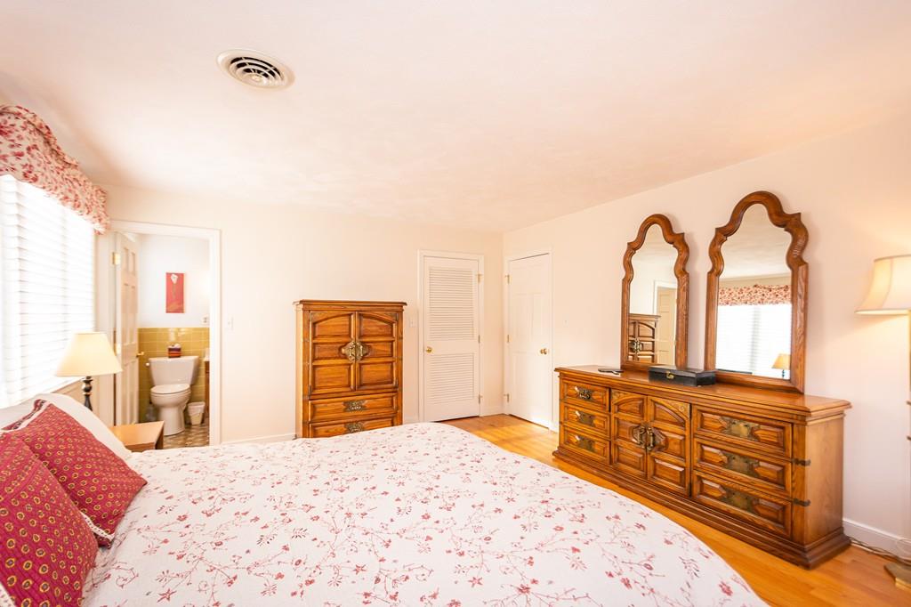 33 Windy Hill Road Cohasset, MA 02025 - Photo 26 of 42 a bedroom with a bed and dresser