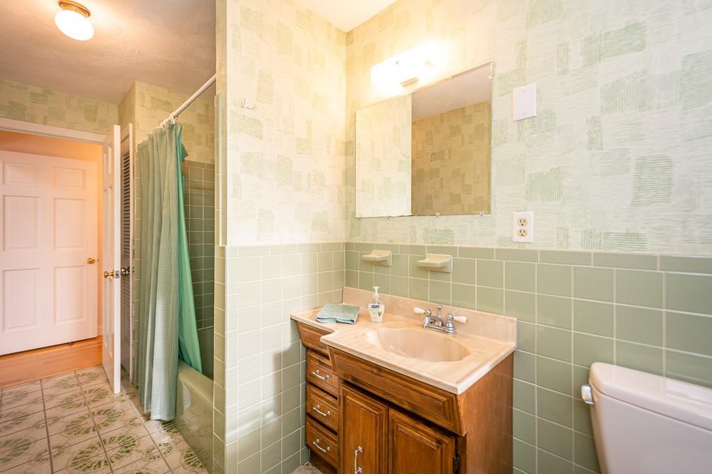 33 Windy Hill Road Cohasset, MA 02025 - Photo 29 of 42 a bathroom with a sink toilet and shower