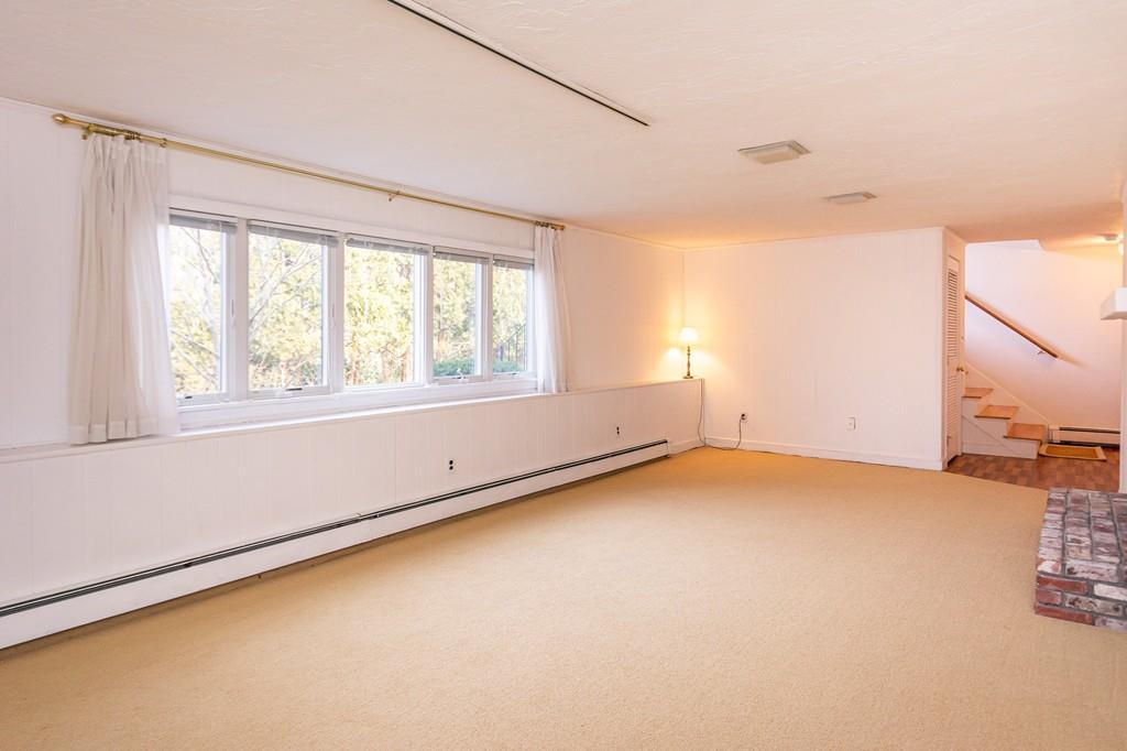 33 Windy Hill Road Cohasset, MA 02025 - Photo 33 of 42 an empty room with windows