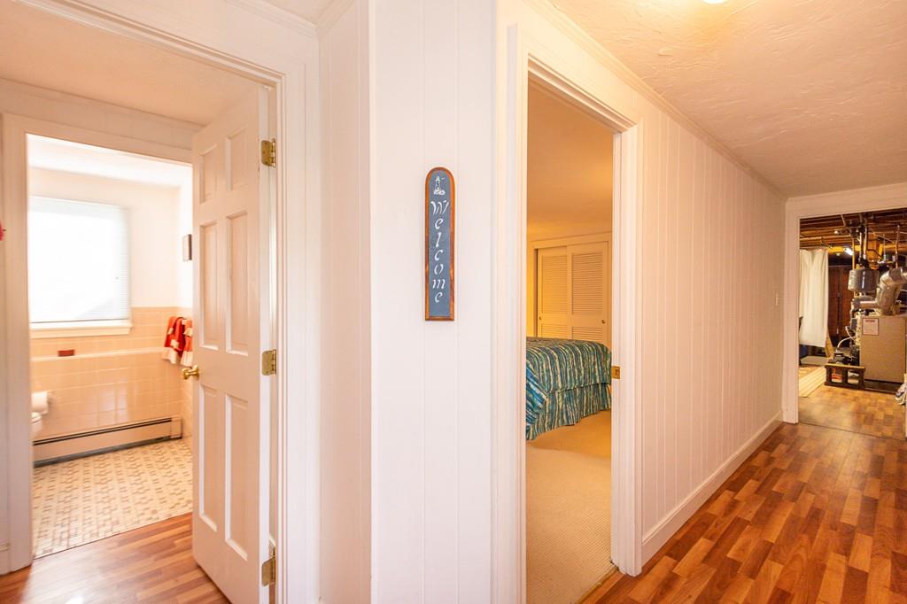 33 Windy Hill Road Cohasset, MA 02025 - Photo 36 of 42 a view of a bathroom from a hallway