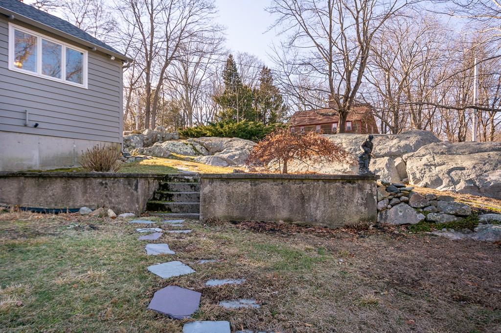 33 Windy Hill Road Cohasset, MA 02025 - Photo 4 of 42 front view of a house with a yard