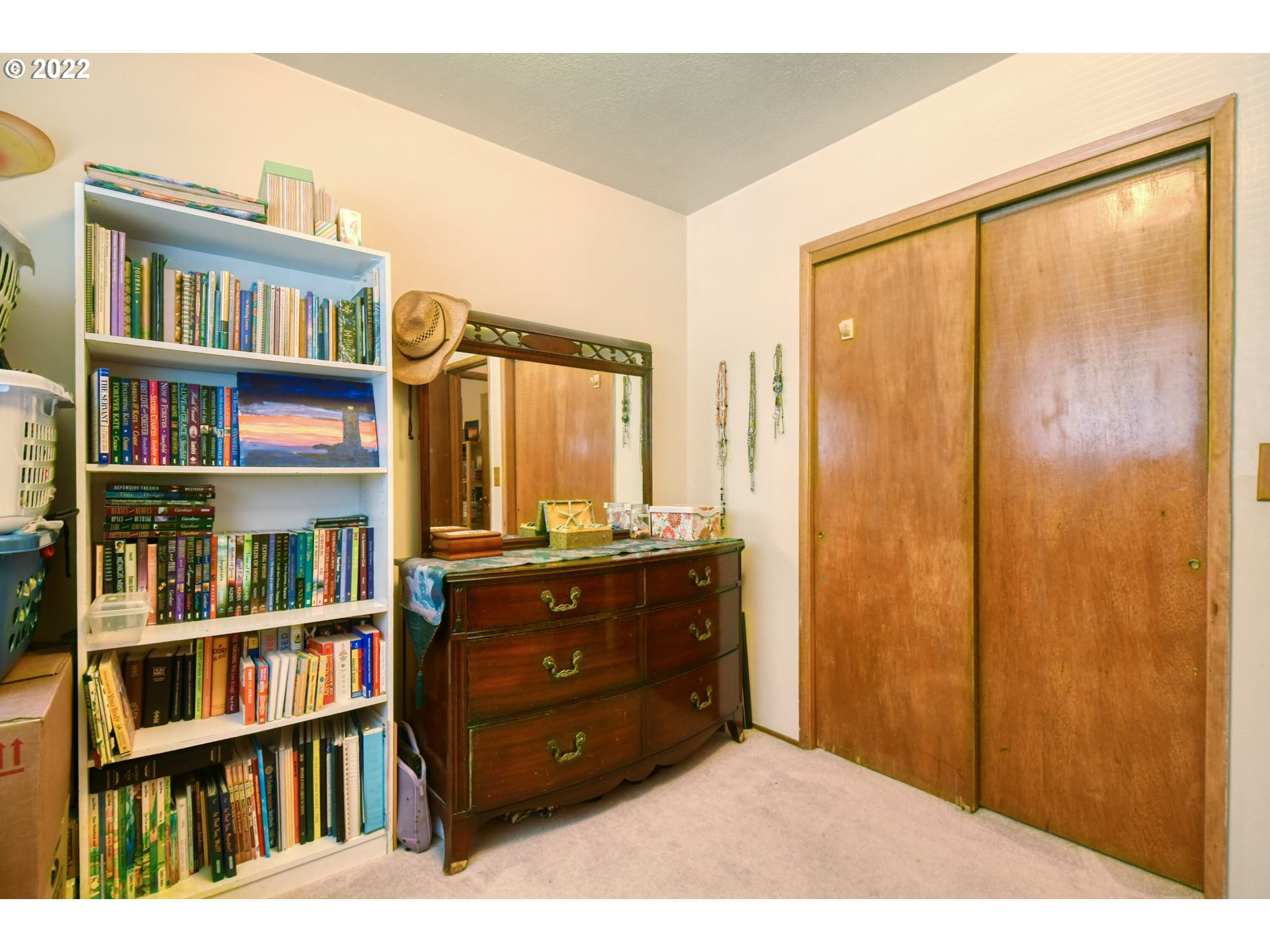 3308 Southwest Kirk Avenue Pendleton, OR 97801 - Photo 14 of 32 a room with a large window and a book shelf