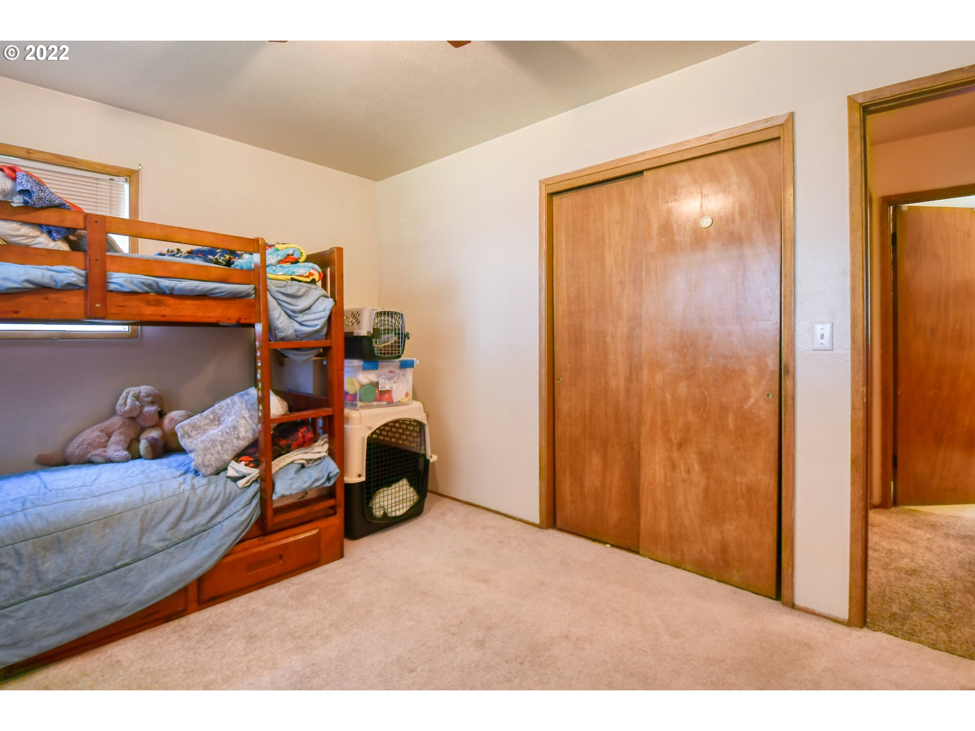 3308 Southwest Kirk Avenue Pendleton, OR 97801 - Photo 18 of 32 a bedroom with a bed and next to a window