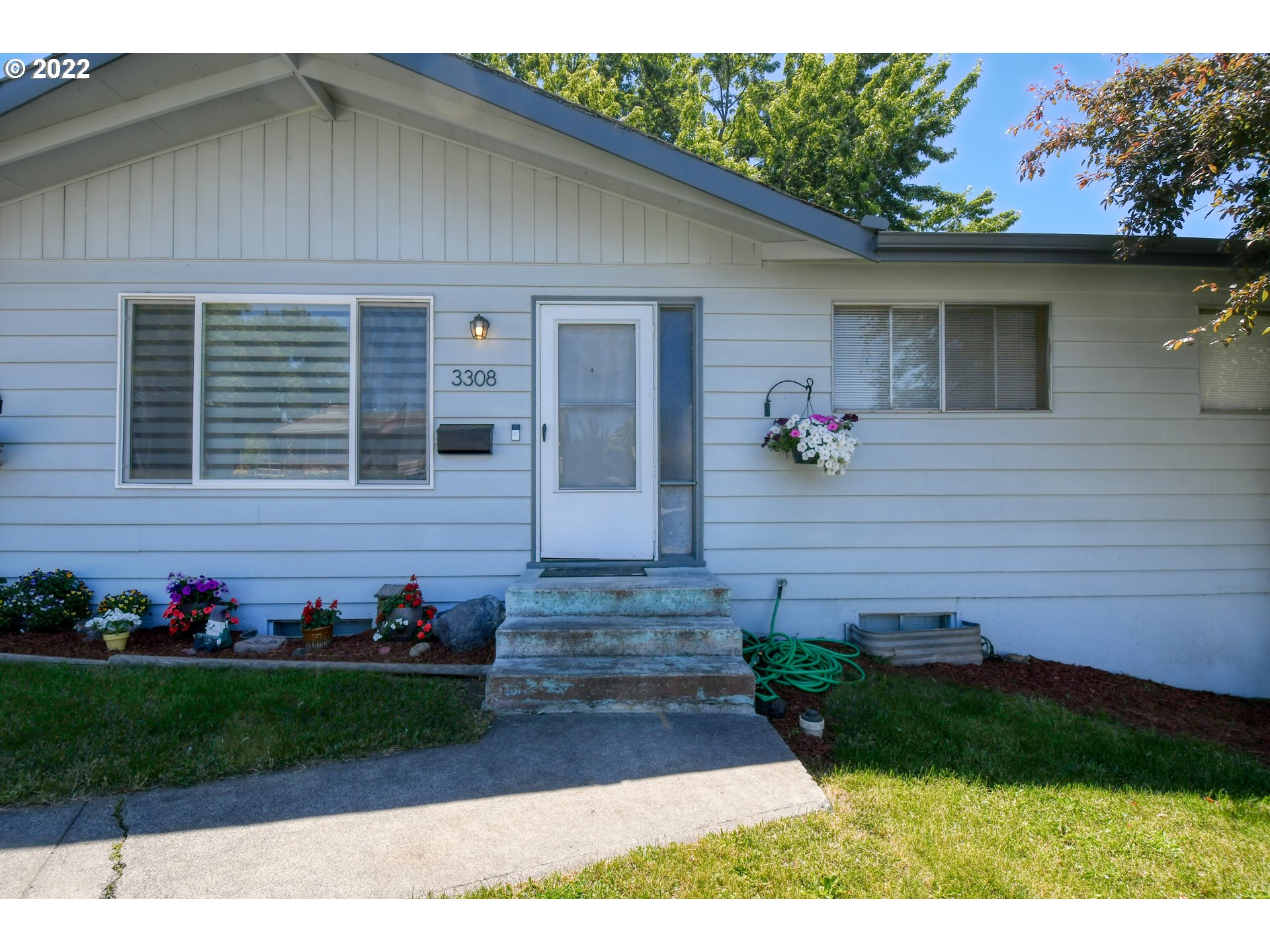 3308 Southwest Kirk Avenue Pendleton, OR 97801 - Photo 2 of 32 a front view of a house with a yard