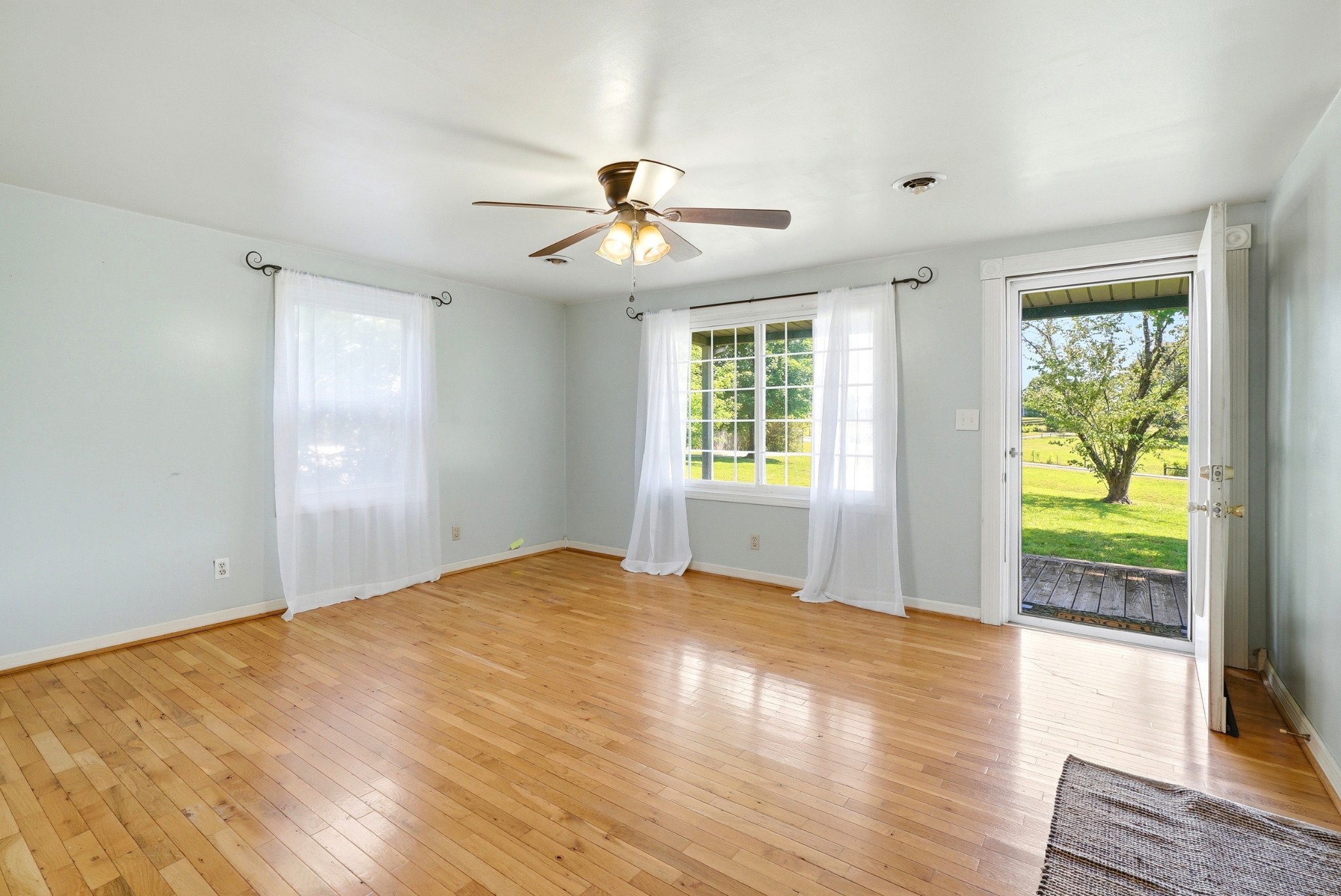 6471 Highway 161 Springfield, TN 37172 - Photo 10 of 57 a view of empty room with wooden floor and fan