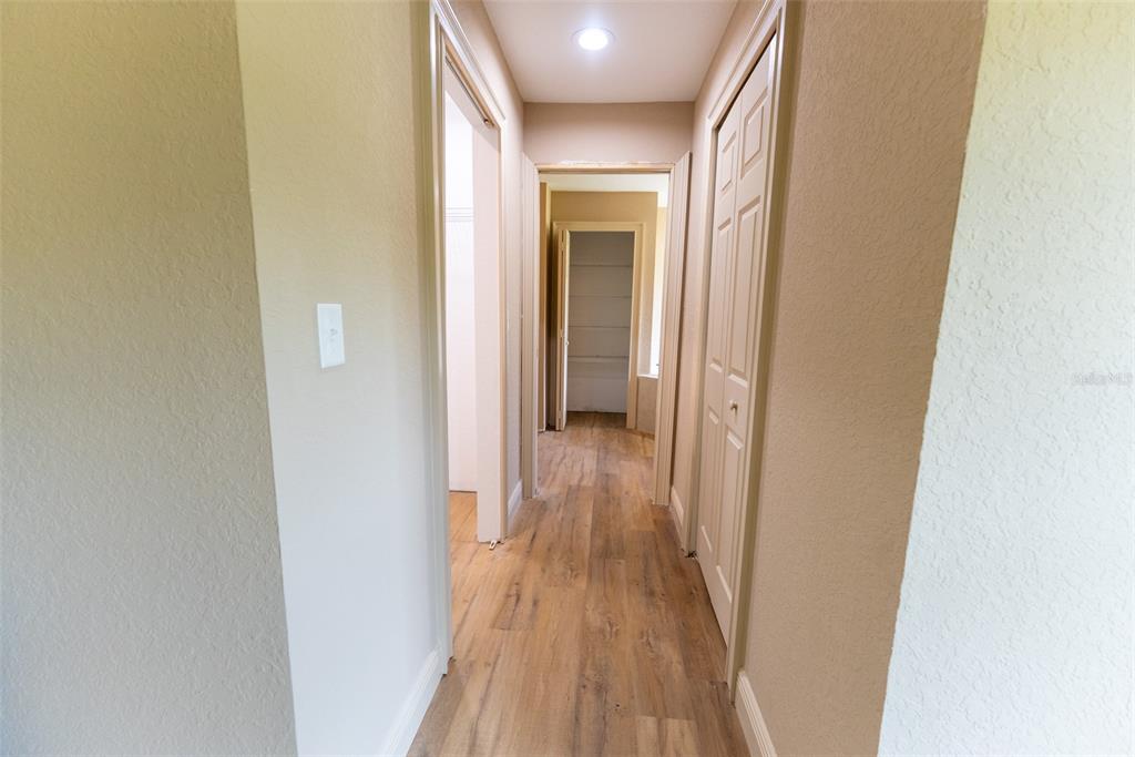 936 Northwest Ridgewood Road Dunnellon, FL 34431 - Photo 37 of 65 a view of a hallway with wooden floor