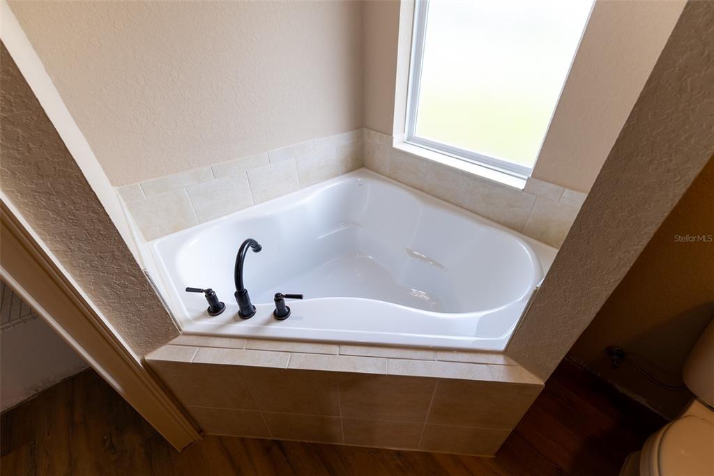 936 Northwest Ridgewood Road Dunnellon, FL 34431 - Photo 44 of 65 a bathroom with a bathtub