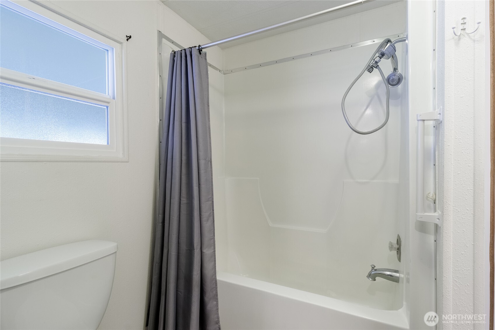 826 Southeast Scenic View Drive College Place, WA 99324 - Photo 14 of 28 a bathroom with a glass shower door
