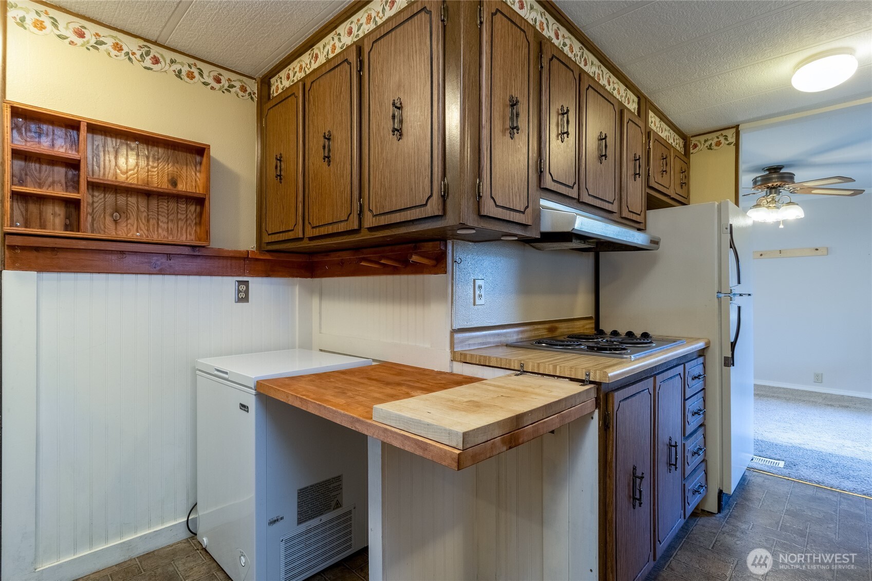 826 Southeast Scenic View Drive College Place, WA 99324 - Photo 18 of 28 a kitchen with stainless steel appliances granite countertop a sink and a stove