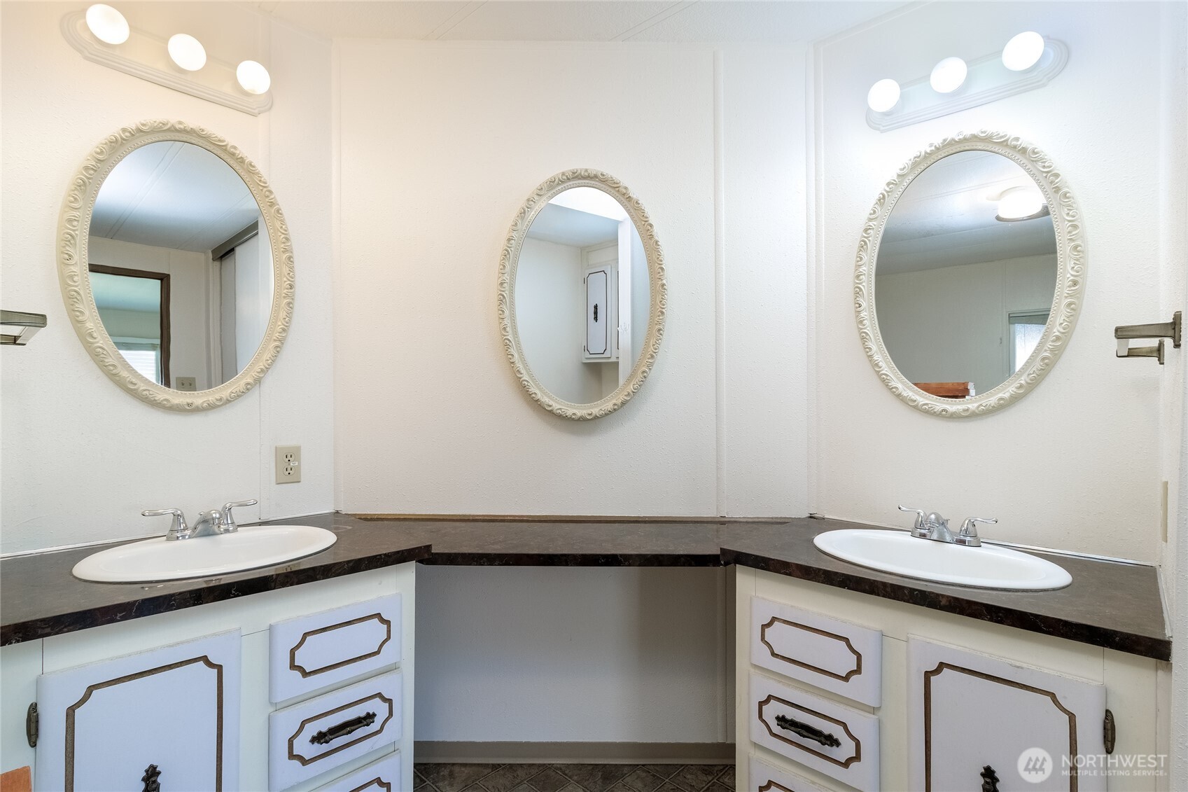 826 Southeast Scenic View Drive College Place, WA 99324 - Photo 23 of 28 a bathroom with a sink and a mirror