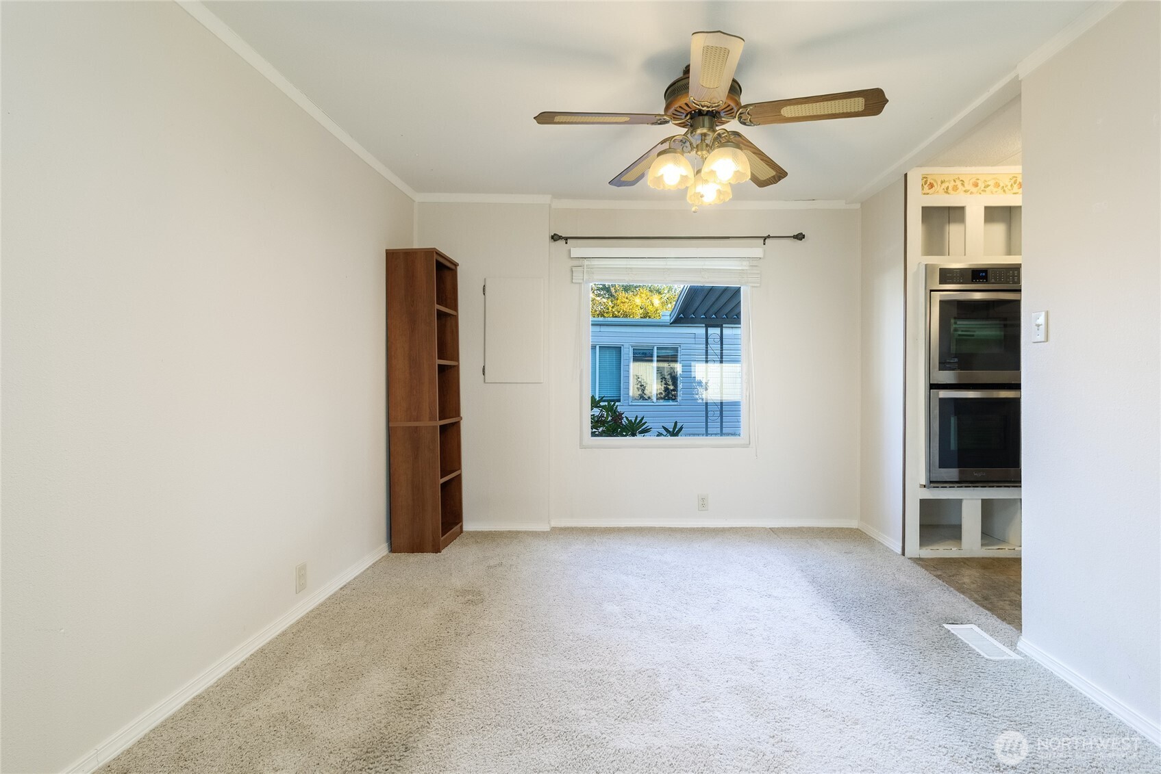 826 Southeast Scenic View Drive College Place, WA 99324 - Photo 6 of 28 an empty room with chandelier fan and windows