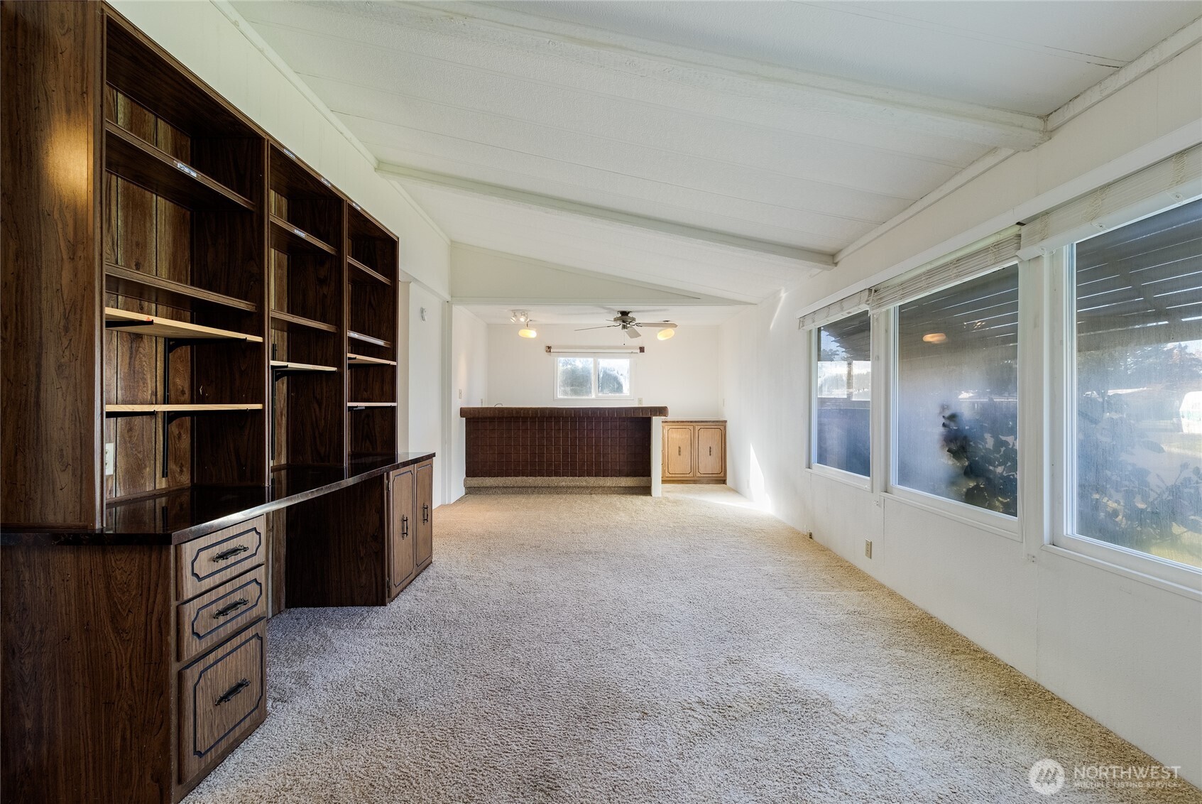 826 Southeast Scenic View Drive College Place, WA 99324 - Photo 8 of 28 a view of an empty room with a fireplace and windows
