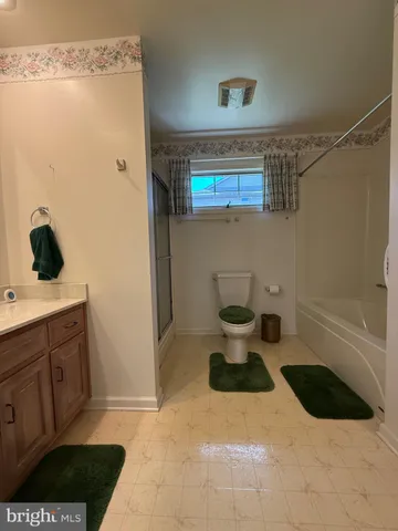 a bathroom with a sink and a shower