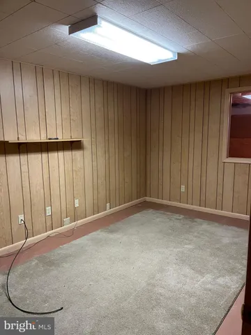 a view of water heater room with an empty space