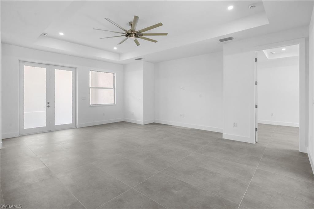 2712 40th Avenue Southeast Naples, FL 34117 - Photo 16 of 41 a view of an empty room with a window